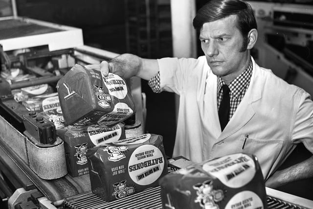 Rathbones bread production director, Roger Rathbone, inspects the new red wrapper loaf as it comes off the softer bake plant line at their bakery in Warrington Road, Newtown, on Tuesday 5th of December 1972.