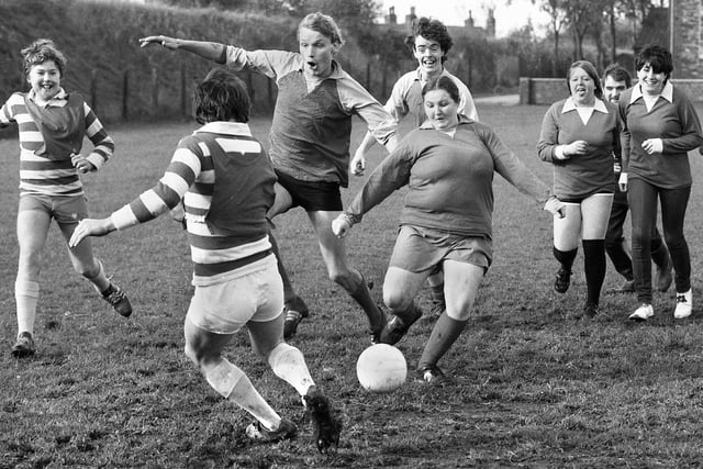 Action from a charity soccer match organised by the Railway Hotel on Moss Lane playing fields, Platt Bridge, in aid of MENCAP on Sunday 17th of October 1982.