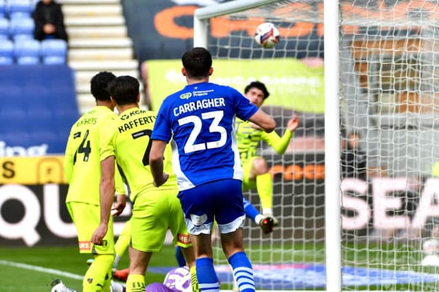 James Carragher nods home a planned corner routine against Rotherham on Monday
