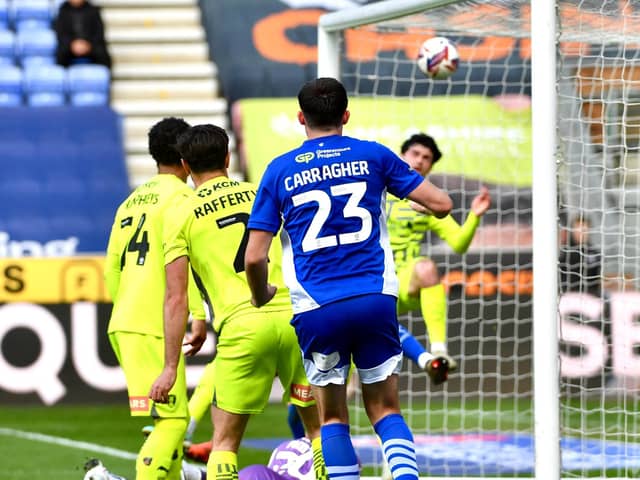 James Carragher nods home a planned corner routine against Rotherham on Monday