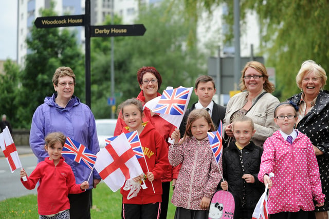 Olympic Torch Relay, Wigan Town Centre:  Flag bearers on Scholes