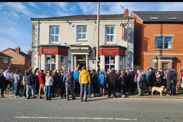 Volunteers gathered at the Brickmakers Arms on Sunday to search for Darren Orme