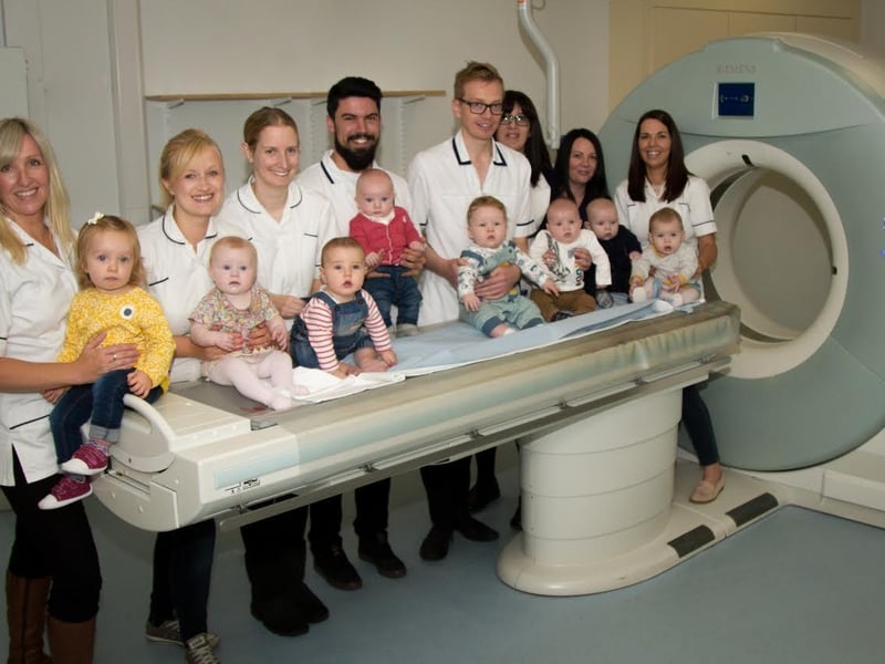 Staff at Wigan Infirmary's X-ray department had a baby boom and created a fund-raising calendar starring their babies. Some of the babies involved are pictured with parents Joanne Owen, Louise Atkinson, Sian McLean, Lewis Gibbons, Lee Unsworth, Cassie White, Angela Blackhurst and Rebecca Holt