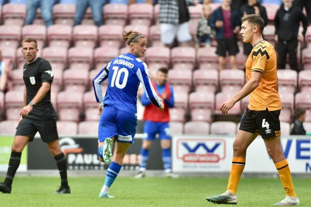 Thelo Aasgaard wheels away after scoring what proved to be the winning goal against Cambridge