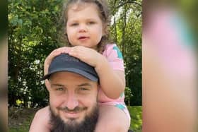 Kieron Sharpe with his daughter