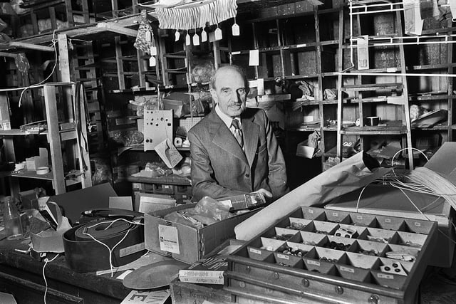 Frank Tickle on his last day in his shop in the Wiend on Monday 3rd of December 1979 before moving to the Times Craft Centre on Mesnes Street.