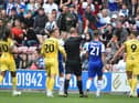 Ched Evans is sent off against Latics on the opening day of the campaign