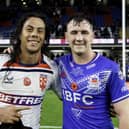 Samoa's Jarome Luai & England's Harry Smith swap shirts at the end of the match at Headingley Stadium