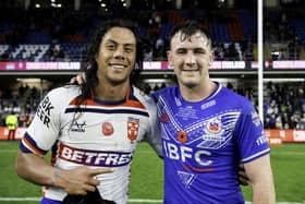 Samoa's Jarome Luai & England's Harry Smith swap shirts at the end of the match at Headingley Stadium