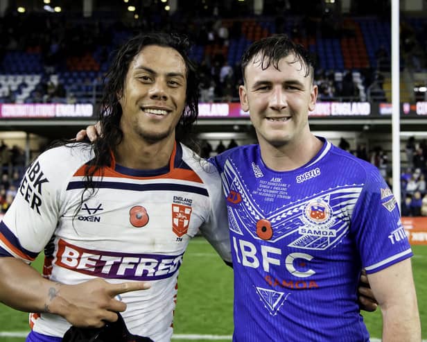 Samoa's Jarome Luai & England's Harry Smith swap shirts at the end of the match at Headingley Stadium