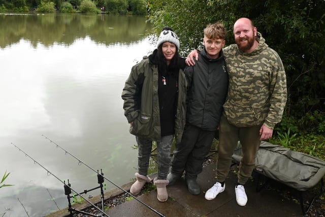 Young angler Oliver Ginty, 13, with Suzanne Davis, left, and Andy Ginty, right.