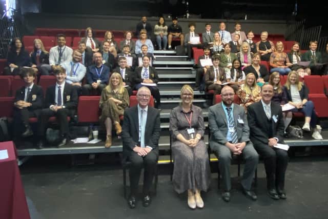 Young contestants, supporters, staff and judges at the speaking competition held at Orrell St John Rigby College