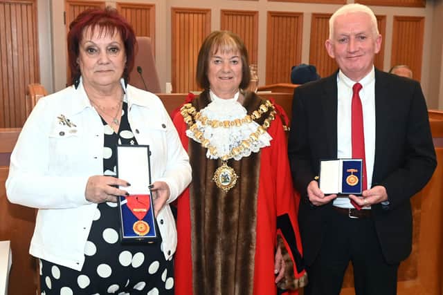 Wigan has a new Mayor as Coun Jenny Bullen, centre,  is pictured with outgoing first citizen Coun Debbie Parkinson and former Consort Coun Terry Mugan