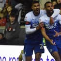 Curtis Tilt is congratulated after his winning goal against Blackpool by Ashley Fletcher