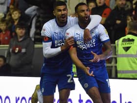 Curtis Tilt is congratulated after his winning goal against Blackpool by Ashley Fletcher