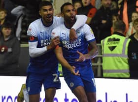 Curtis Tilt is congratulated after his winning goal against Blackpool by Ashley Fletcher
