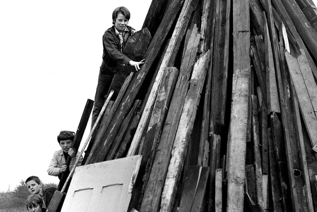 RETRO 1970 A group of enterprising lads build their bonfire, on waste land in Wigan, ready for Guy Fawkes Night, on November the fifth 1970