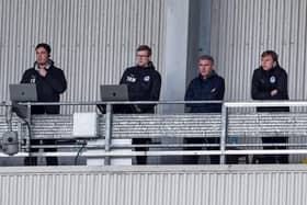 Ryan Lowe (second right) has been impressed by the quality of support he's received from the existing Latics backroom staff