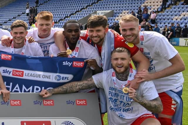 Gavin Massey in the centre of the title celebrations at Shrewsbury