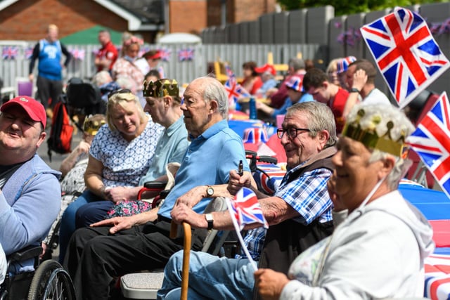 Residents and staff at the Appleby Court Nursing Home Platinum Jubilee Party in Wigan. Photo: Kelvin Stuttard