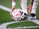 LEICESTER, ENGLAND - MARCH 21: The Mitre Delta Max FA Cup match ball is placed on the corner spot during the Emirates FA Cup Quarter Final match between Chelsea FC and Sheffield Untied at Stamford Bridge on March 21, 2021 in London, England. (Photo by Alex Pantling/Getty Images)