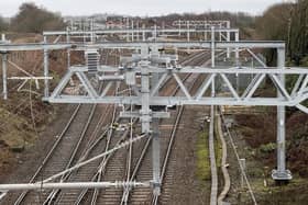 New overhead line stanchions and cables on the Wigan to Bolton route