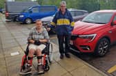 Ian Hurst and his dad Michael who are far from happy about Wigan Council's new disabled transport arrangements