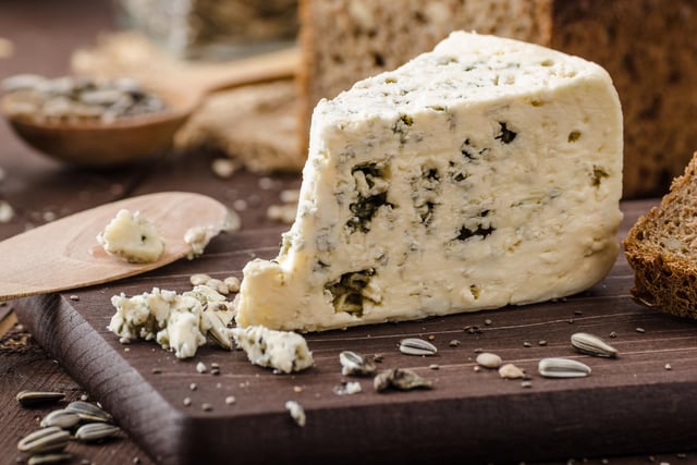 Blue cheese such as Roquefort contain a compound called roquefortine C, which is known to cause muscle tremors and seizures in cats and dogs for up to two days.