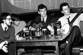 1969  Jake Thakray joining local folk fans at Wigan's Park Hotel .