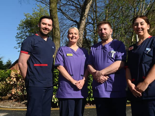Nursing staff Brad Price, Lauren Clay, Peter Burgess and Natasha Rigby in their new uniforms