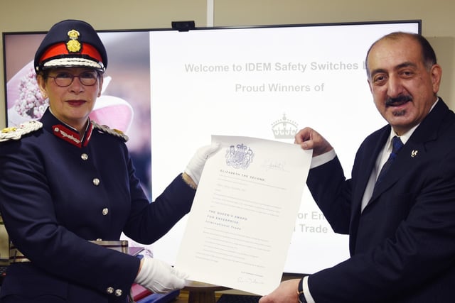 from left,  Greater Manchester Lord Lieutenant Diane Hawkins representing his majesty the King, presents Idem managing director Medi Mohtasham with the award certificate.