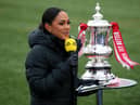 The BBC's Alex Scott with the FA Cup trophy