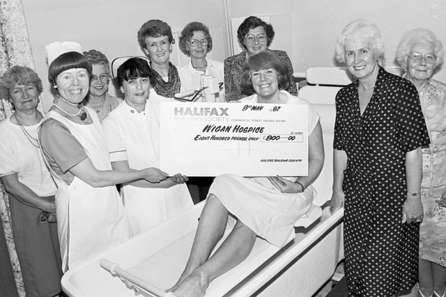 Retro 1987  - The ladies of Standish Inner Wheel hand over £800 to Wigan and Leigh Hospice