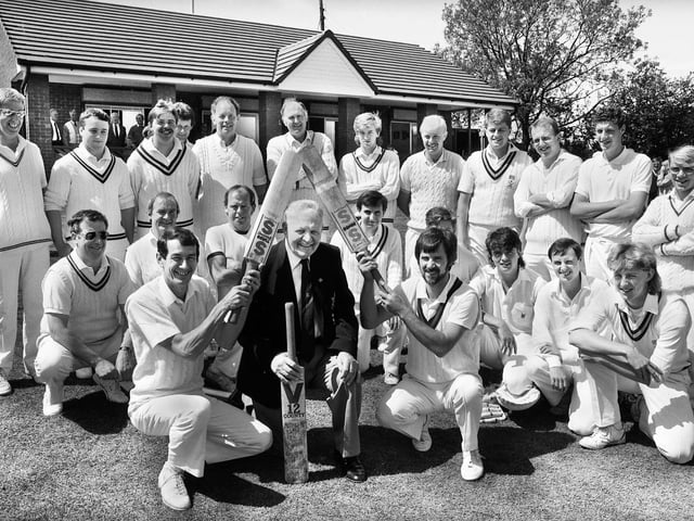 Dalton Cricket Club Life Member Joe Flaherty is given a guard of honour by Dalton captain Arthur Ball and Eccleston captain Tom Taylor after officially opening the club's new pavillion on Sunday 29th of May 1988. The teams competing played in the first match at Dalton in 1888.