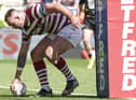Kaide Ellis went over for his first try in cherry and white