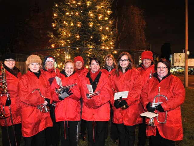 Friends of Bryn organised a Carol Service at Bryn Christmas Tree, Wigan Road, Bryn.
Pictured are the Trinity Girls Brass Band