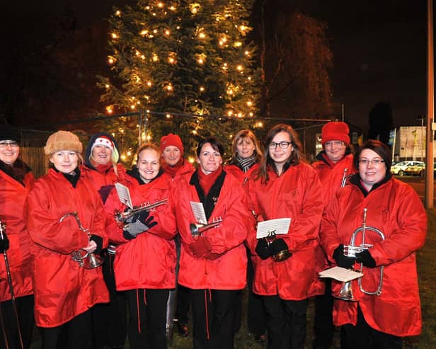 Friends of Bryn organised a Carol Service at Bryn Christmas Tree, Wigan Road, Bryn.
Pictured are the Trinity Girls Brass Band