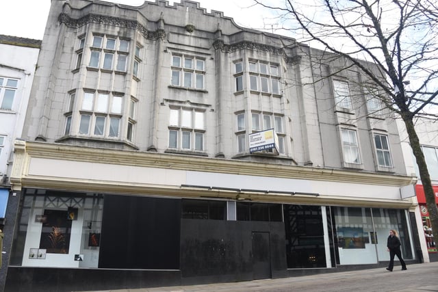 The former Marks and Spencer, M&S shop, Standishgate, Wigan - The windows are used as an exhibition space for artists.