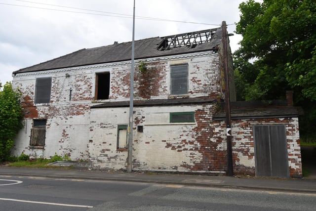 The former restaurant and takeaway Monsoon sits empty and vandalised at the side of the canal on Poolstock. It is one of Wigan's longest-running eyesores