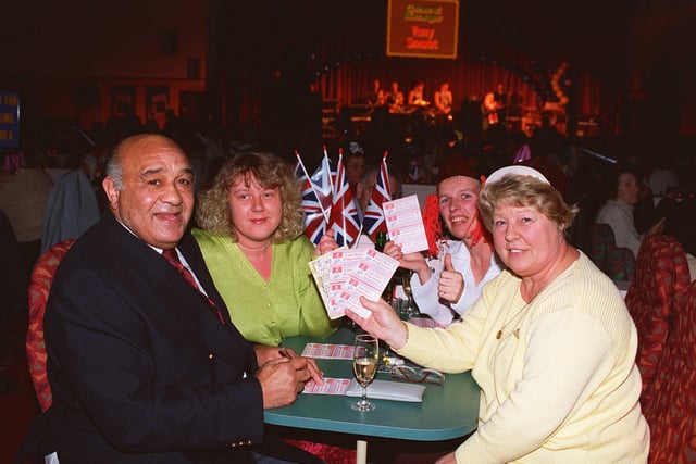 Game on...Wigan RL legend Billy Boston meets some of the first customers to play bingo at the new Gala Club, at Robin Park, Wigan, after he performed the official opening ceremony.  Left to right are locals Angela Gore, Elizabeth Hamer and Brenda Ellis.  