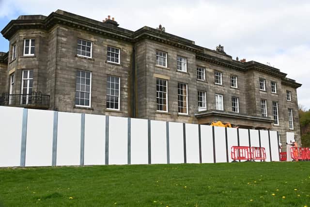 A large fence is being erected around Haigh Hall, the first steps of the renovation of the historic hall after funding was awarded.