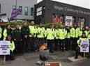 Staff from North West Ambulance Service on a picket line outside Wigan Community Fire and Ambulance Station in January