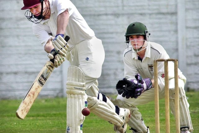 Gary Hughes clips the ball away as Norley beat Burscough in a Southport and District League match on Saturday 26th of May 2001.