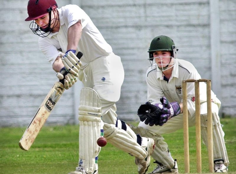 Gary Hughes clips the ball away as Norley beat Burscough in a Southport and District League match on Saturday 26th of May 2001.