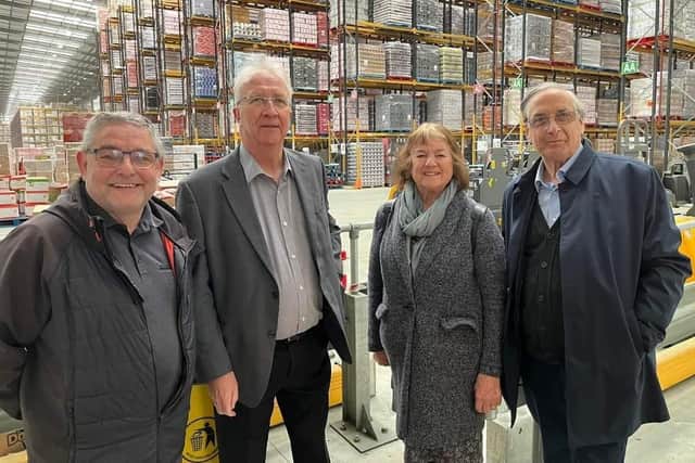 Councillors visit the Poundland warehouse to learn about the work of The Hamlet's trainees