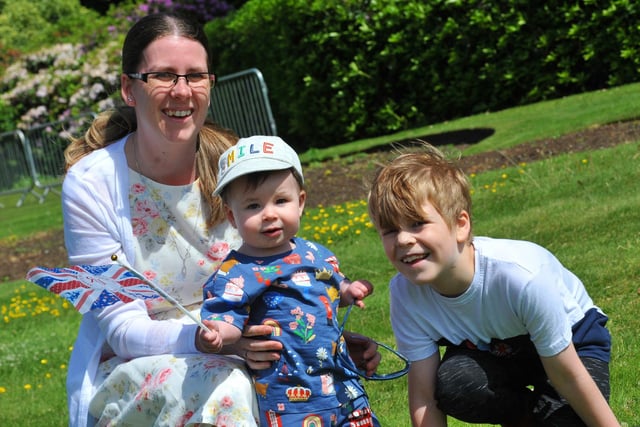 From left, Suzanne Clark with Sophie, one, and Leo, seven, get into the spirit of the event.
Family fun at the Jubilee Party in the Park, with food, stalls and entertainment, celebrating the Queen's platinum Jubilee at Mesnes Park, Wigan.