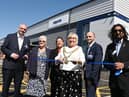 The Mayor of Wigan Coun Marie Morgan, centre, cuts the ribbon to officially open  Algeco, Europe's leading modular and offsite building solutions brand, on the former site of Morrisons supermarket, in Ince