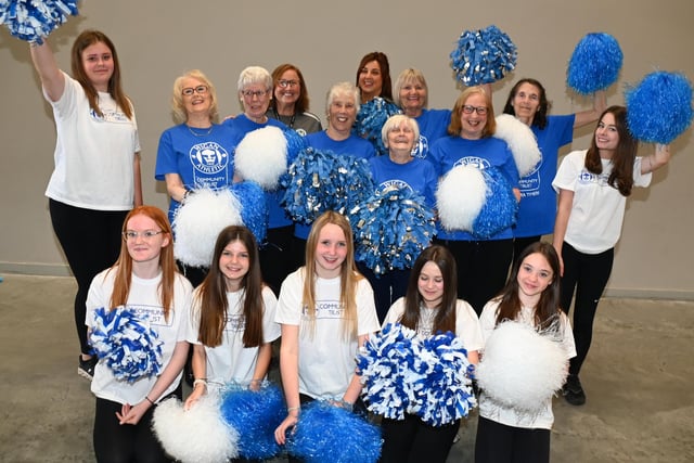 Wigan Athletic Community Trust Extra Time choir with cheerleaders.