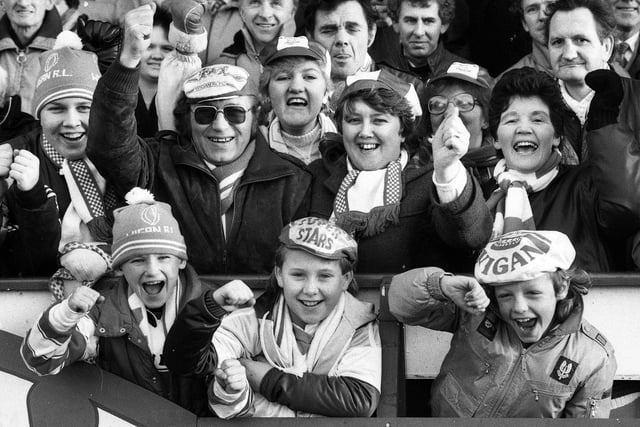Wigan fans at the league game against St. Helens at Central Park on Boxing Day Thursday 26th of December 1985. Wigan won the match 38-14.