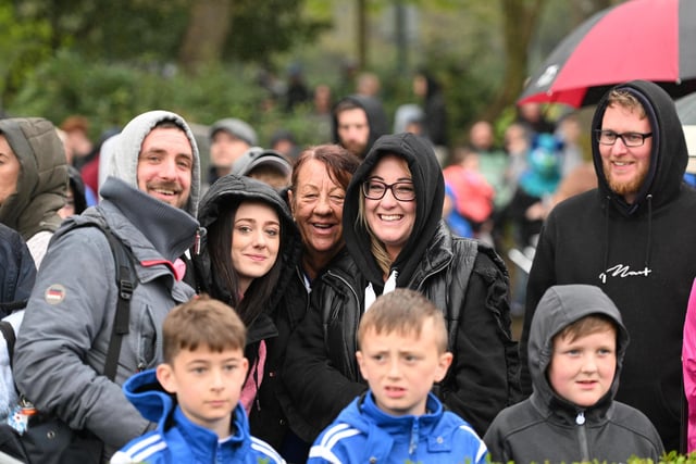 Fans braved the rain to celebrate with Wigan Athletic players and staff